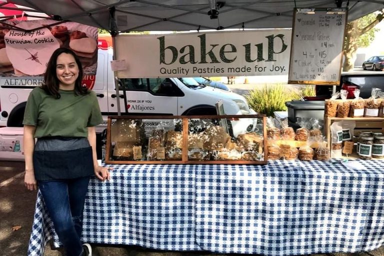 Woman with baked goods.